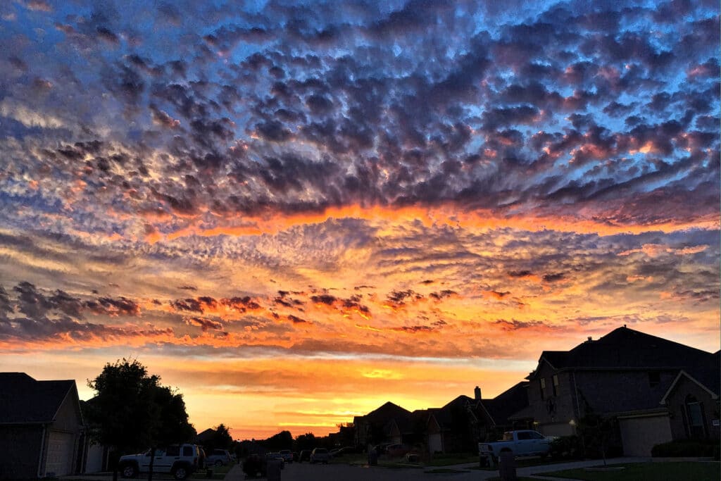 Sunrise over Little Elm, Texas. Marks in the sky.
